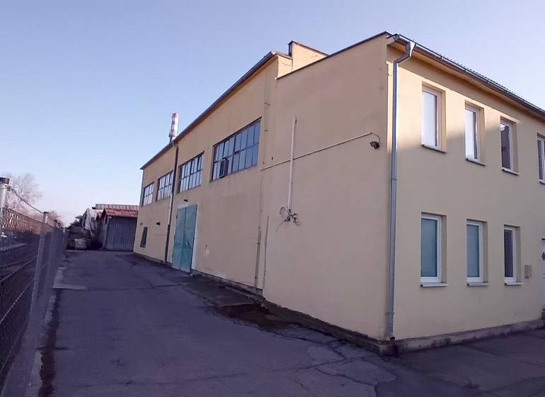 Building in Trnava on Coburgova Street, suitable for warehouses and halls.