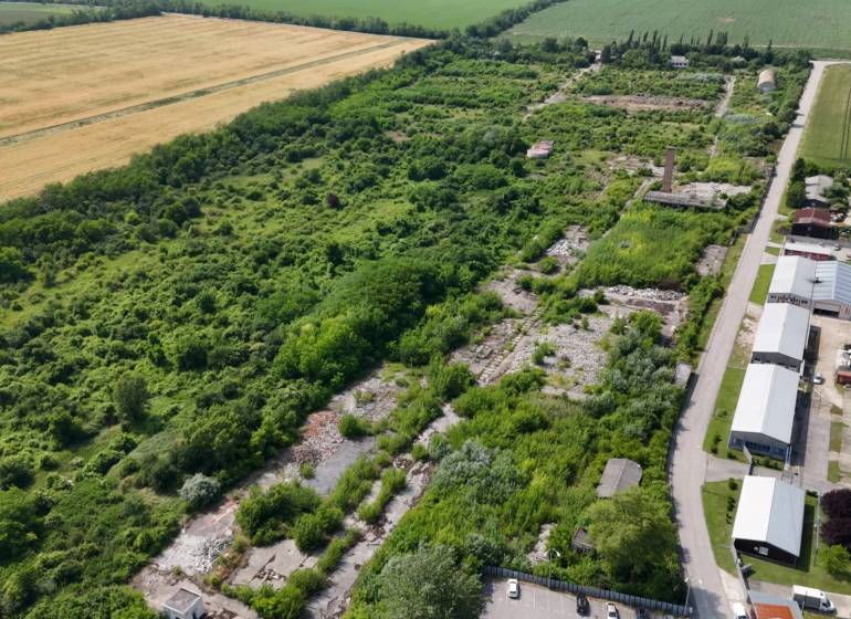 Aerial view of commercial land in Ivanka pri Nitre surrounded by greenery.
