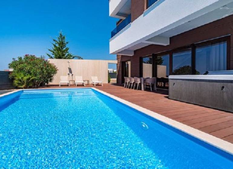 Villa in Novalja with a pool and terrace, ideal for relaxing by the sea.