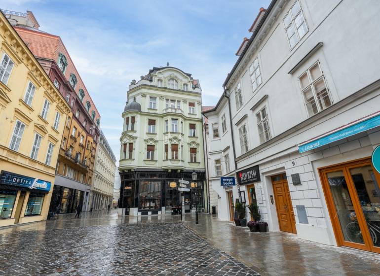 Laurinská Street in Bratislava - Old Town, surrounded by historical buildings and dining establishments.