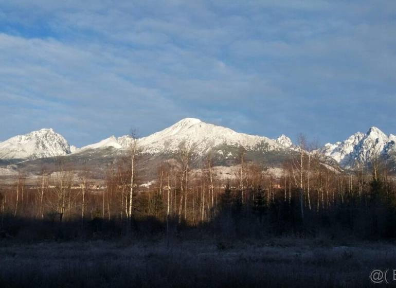 Snow-capped peaks of the High Tatras near Veľký Slavkov on Horný Slávkov Street.