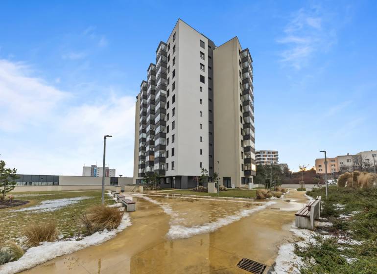 Residential complex on Rudroffova Street in Bratislava-Rača, modern architecture with landscaped gardens.
