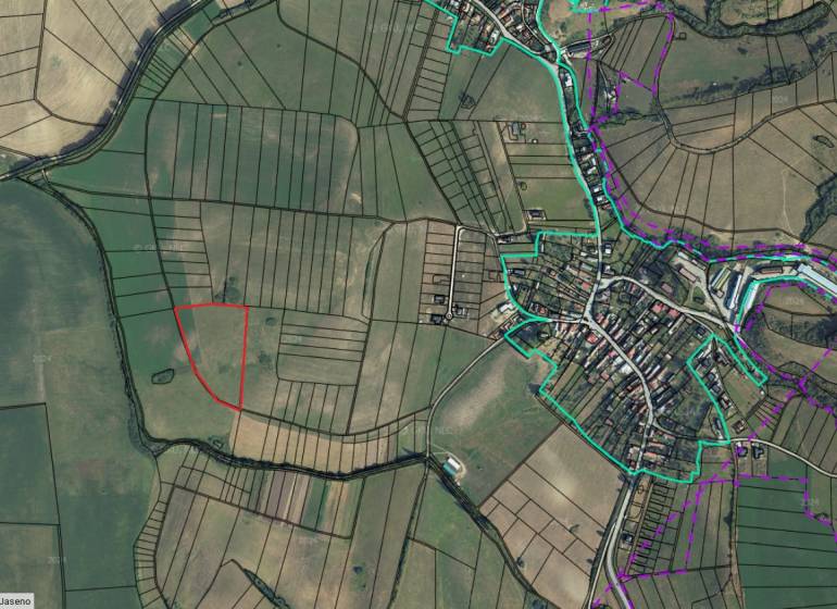Aerial view of agricultural and forest lands in the village of Turčianske Jaseno.