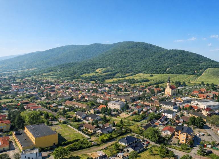 Aerial view of Horné Orešany, visible architecture and surrounding landscape. Plots - housing.