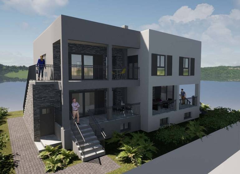 A recreational apartment on Čiovo with a view of the water and greenery in the background.