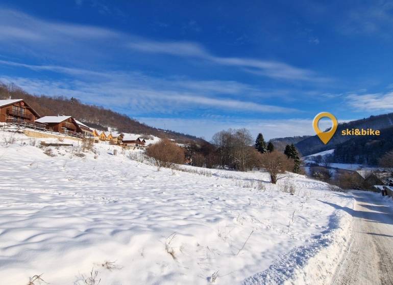 Snow-covered cottages on Recreational Land in Fongrube in Mýto pod Ďumbierom.