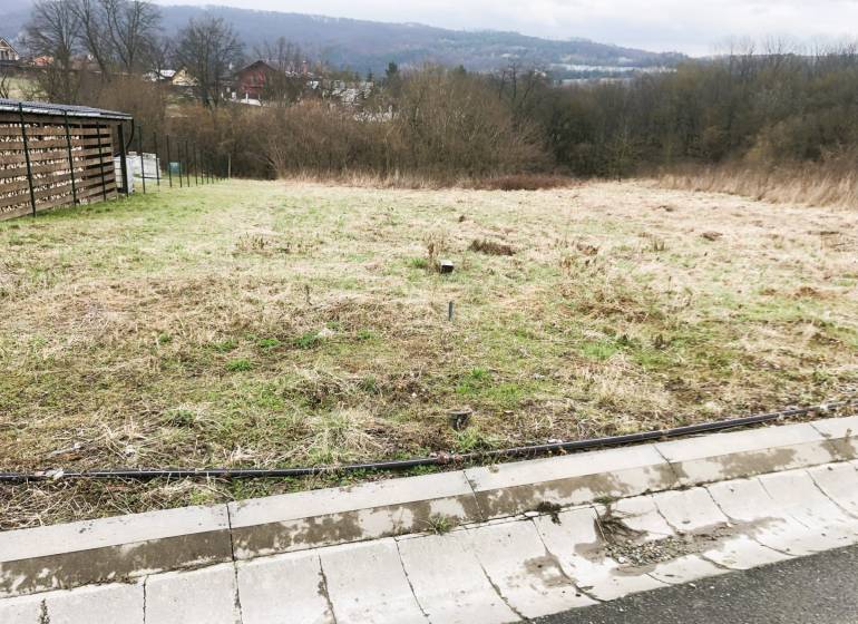 Land designated for residential use in Sokoľ, with a view of the surrounding landscape.
