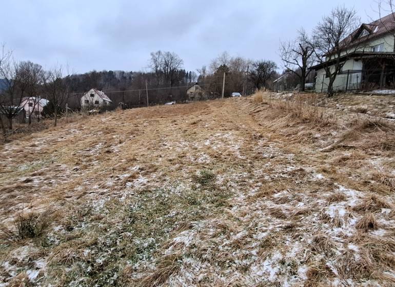 A snowy plot on the outskirts of Skalité, suitable for living with surrounding nature.