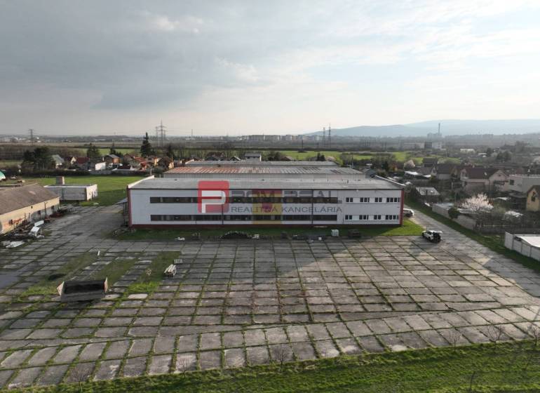 Production premises on Pezinská Street in Vinosady with a large paved area.
