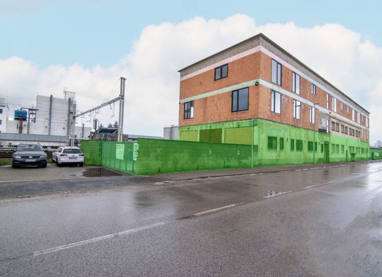 The building on Nádražná Street in Šenkvice, serving as warehouses and halls.