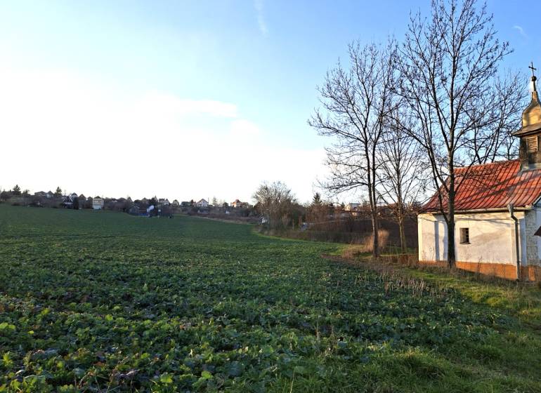 Chapel on the Recreational Grounds in Vráble, Vinice Street, surrounded by fields and trees.