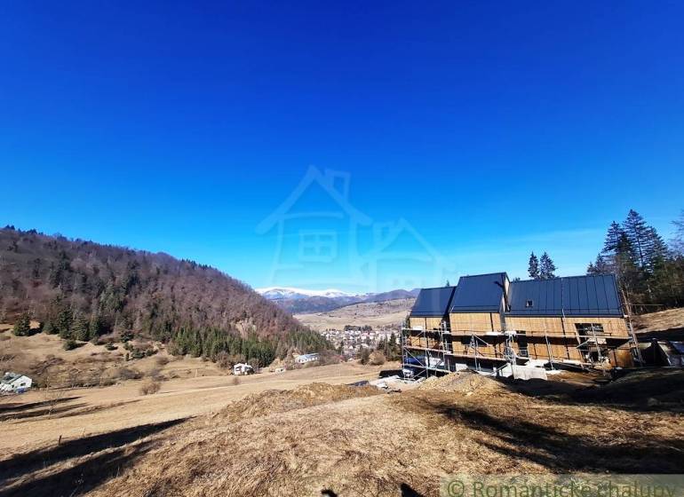 Construction of a house on agricultural and forest land in Hronec with a mountain panorama.