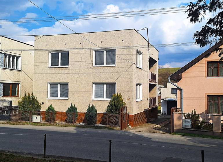 A family house in Gemerský Jablonec with a simple facade and a small garden.