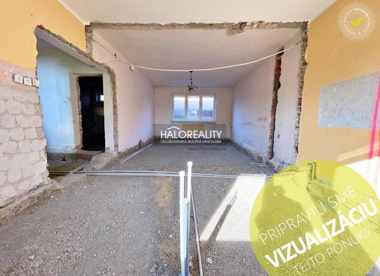 A house under renovation with exposed walls and bare floors.