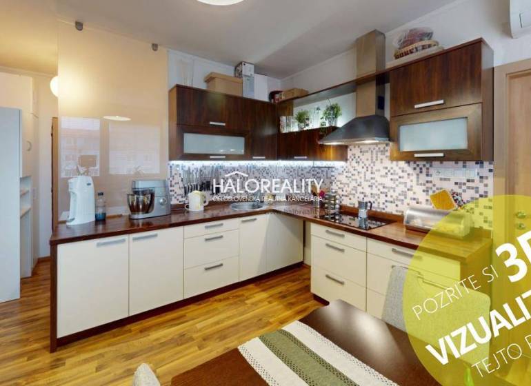 Spacious kitchen in a 2-room apartment with a wooden decor floor and white cabinets.