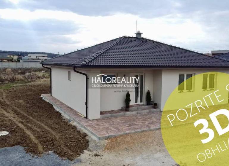 A family house in Rimavské Janovce with a nicely landscaped exterior and a terrace.
