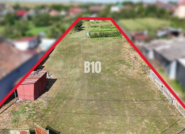 Land for housing in Rumanová with a focus on grassy area and construction.