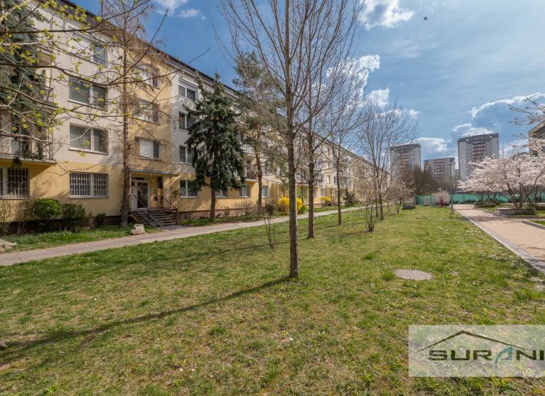 3-room apartment on Kostlivého Street in Bratislava - Ružinov, surrounded by greenery and walkways.