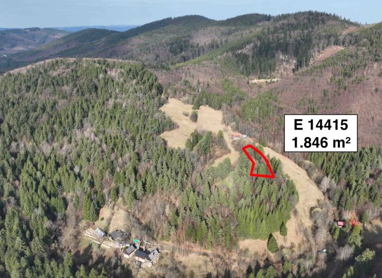 Aerial view of agricultural and forest land in Lazy pod Makytou surrounded by forests.