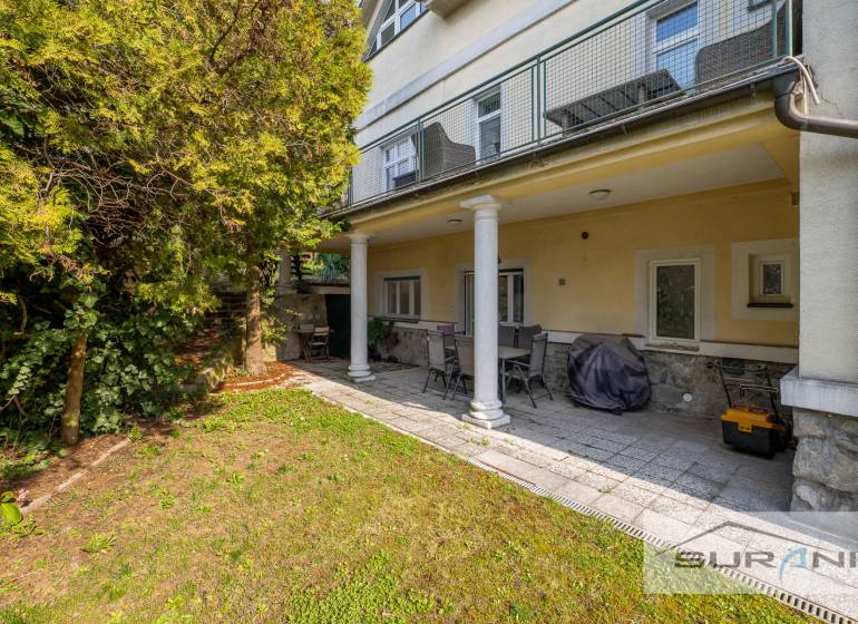 Garden with seating at a 4-room apartment on Krčméryho Street, Bratislava - Staré Mesto.