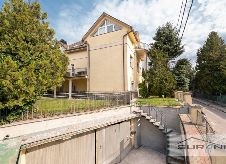 Yellow house with a garden and garage on Krčméryho Street in Bratislava - Old Town.