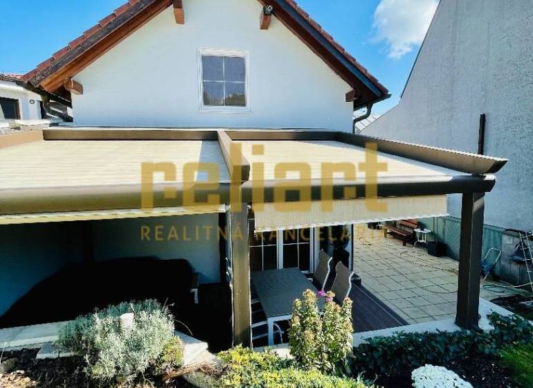 A family house on Kozičova Street in Bratislava - Devín with a terrace and garden.