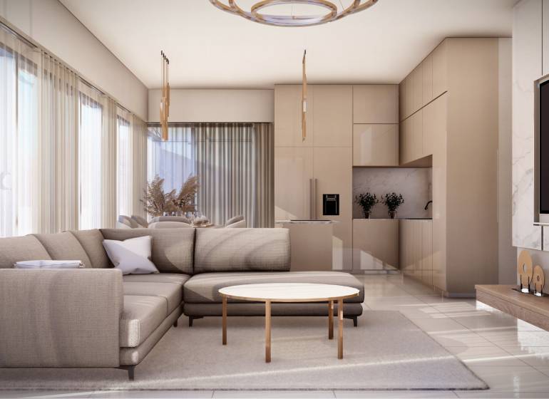 Living room with a sofa, table, and kitchenette in a 4-room apartment.