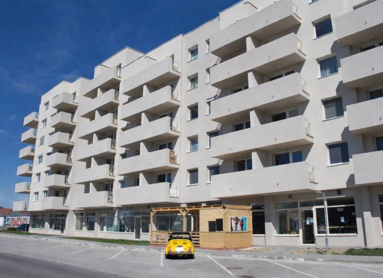 Apartment building on Dukelská in Bernolákovo with parking spaces and gastro premises.