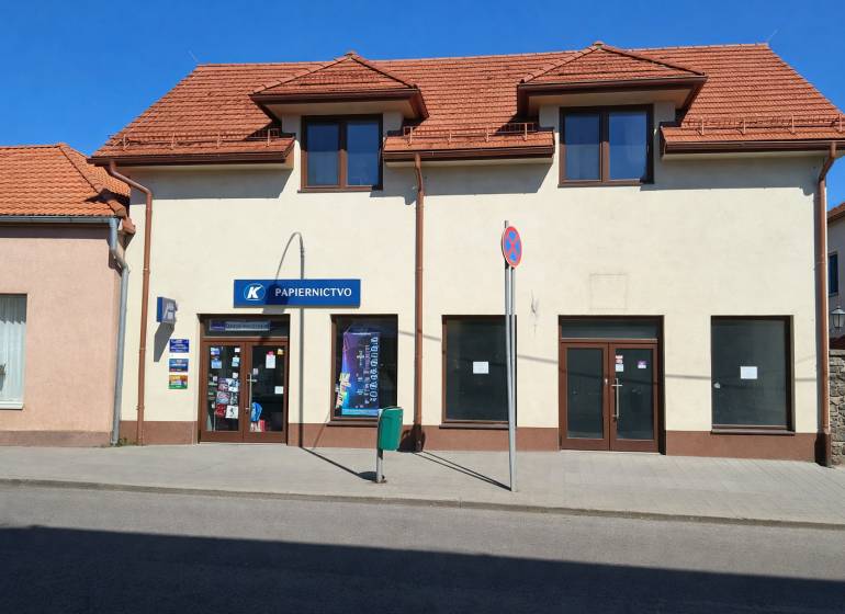 Commercial premises on Obchodná Street in Krupina with a sloped roof and display windows.