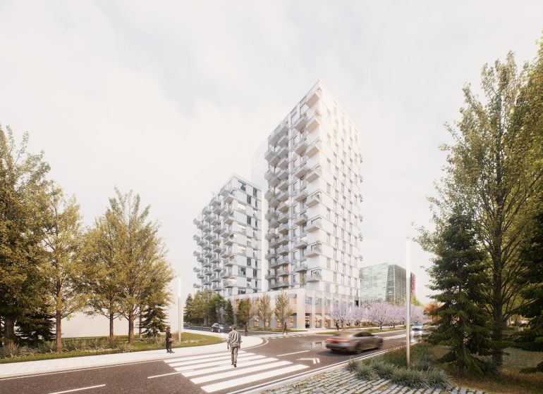 High-rise buildings with balconies and a road in Bratislava - Ružinov on Mlynské nivy.