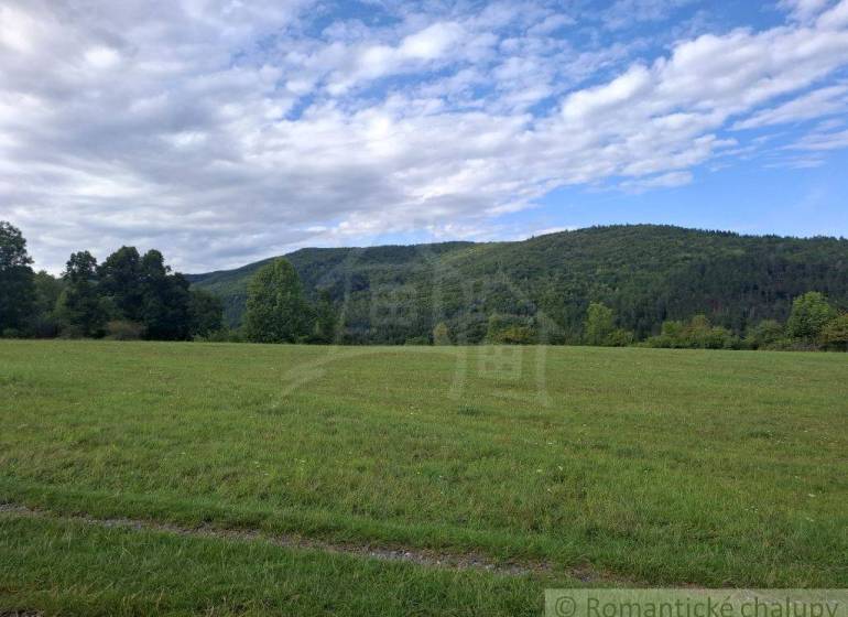 The greenery and hills in the Horný Tisovník area offer opportunities for residential plots.