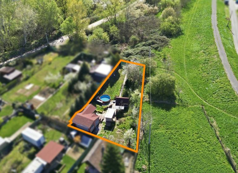 Aerial photograph of a garden in Kráľová nad Váhom with a pool and surrounding vegetation.