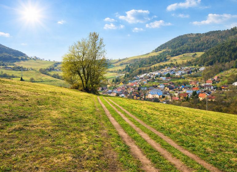 Idyllic landscape in Kotrčina Lúčka with agricultural and forest lands spreading around the village.