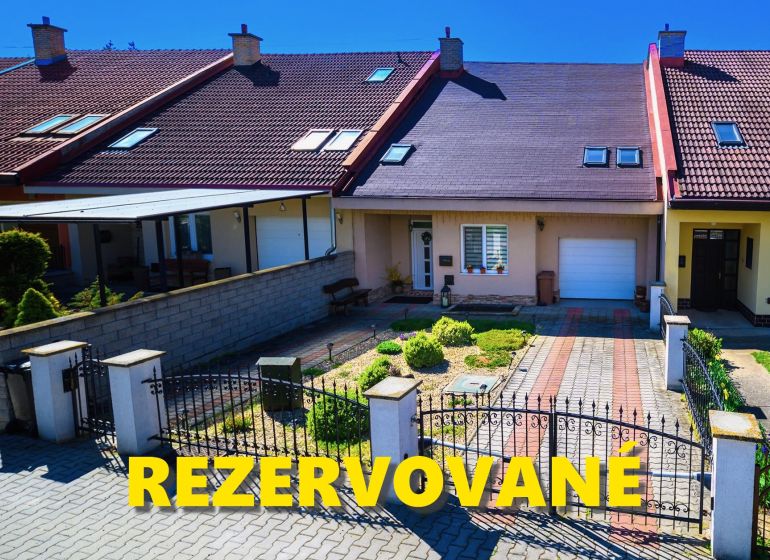 A family house in Rimavská Sobota with a garden, gate, and parking space.