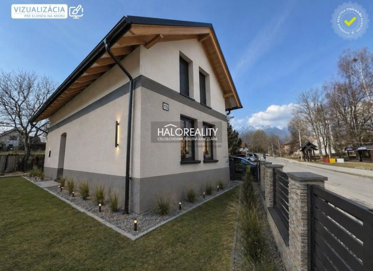 A family house in Nová Lesná with wooden cladding and a stone facade, mountain view.
