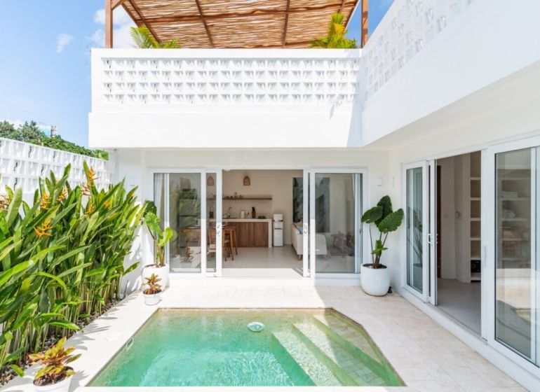 Bali Villa: Entrance to the terrace with a pool, sliding doors, plants in pots.
