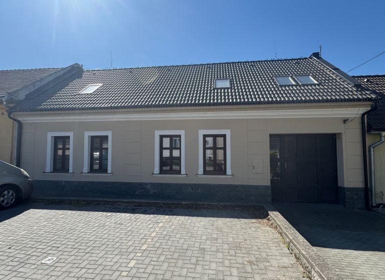 A family house on Petőfi Street in Šahy with a dark roof and three windows.