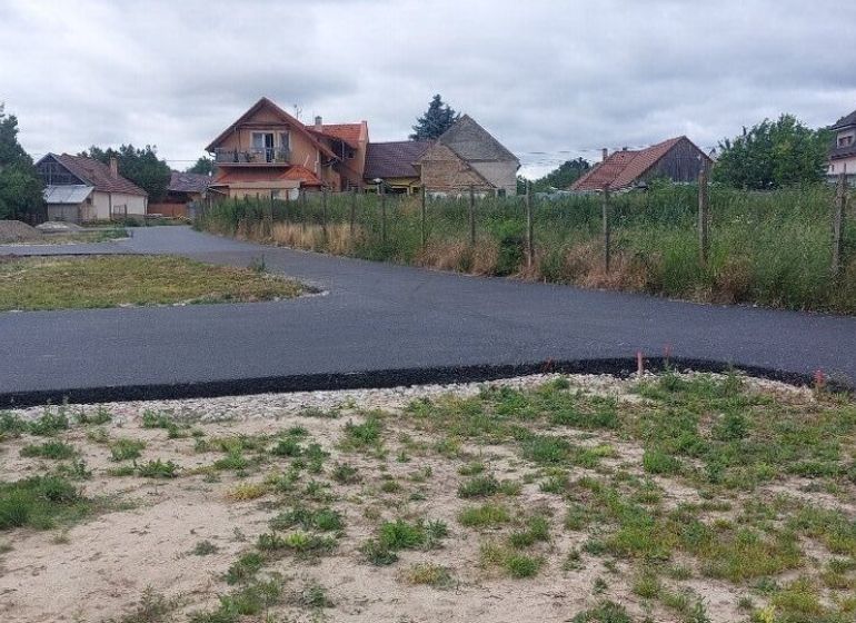 Reinforced road near residential plots in Malá Mača.