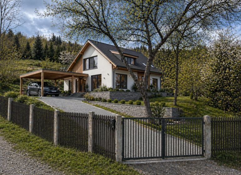 A house with a garden and a gazebo in Krásno nad Kysucou intended for residential plots.