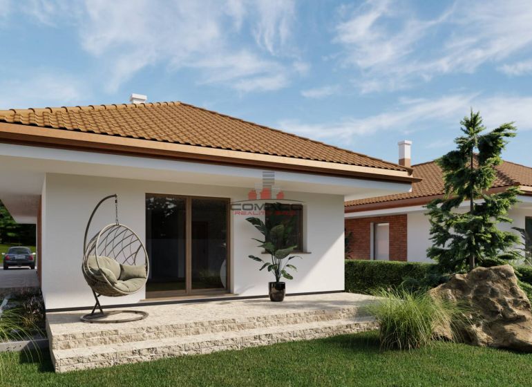 A family house in Veselé with a terrace, a comfortable armchair, and a beautiful garden.