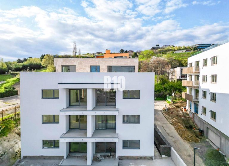 A new building with balconies, surrounded by greenery in Bratislava-Nové Mesto, offers 3-room apartments.