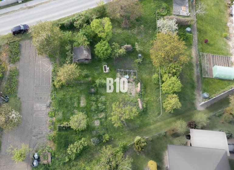 Aerial view of a green garden on a residential plot in Dunajská Lužná.