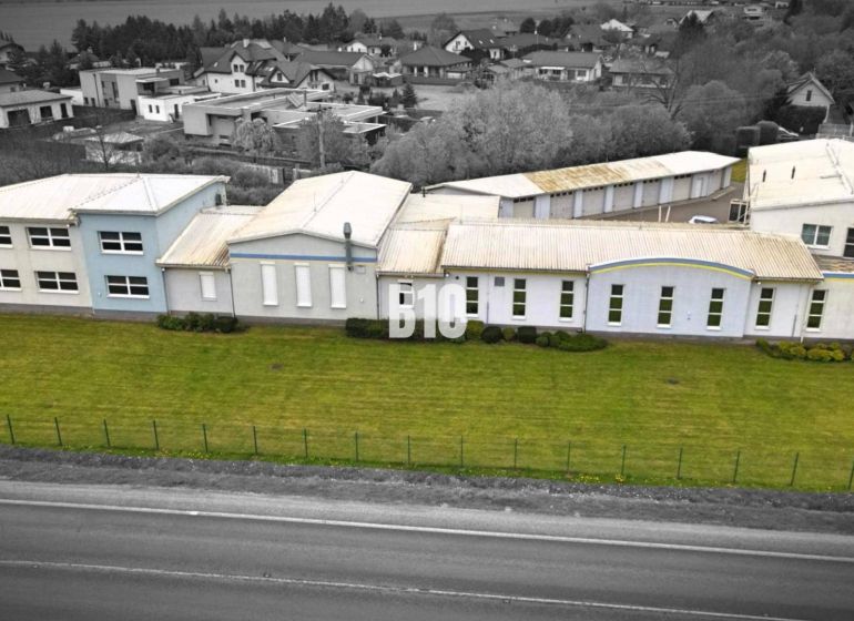 Production premises in Košťany nad Turcom with a spacious green area in the industrial zone.