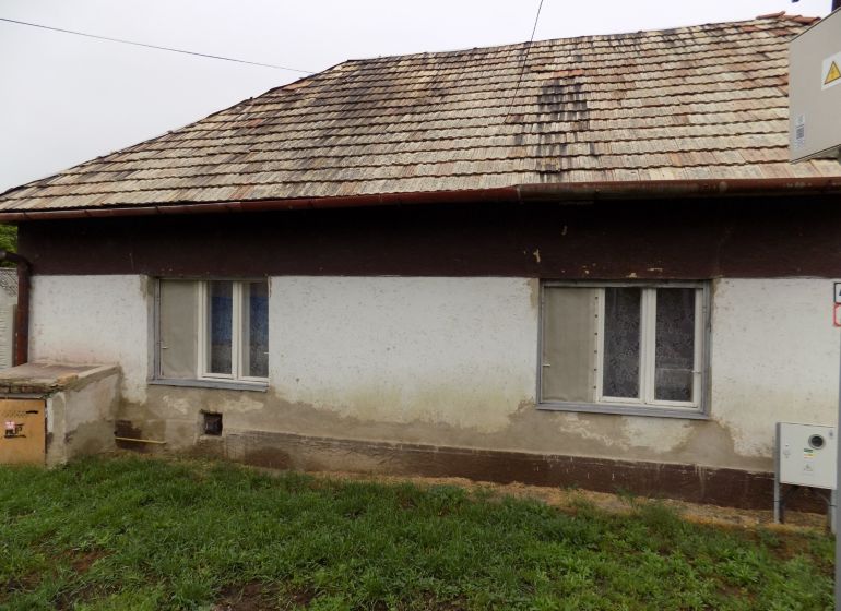 A family house on Gbelce Street in Gbelce with a simple exterior and a gable roof.