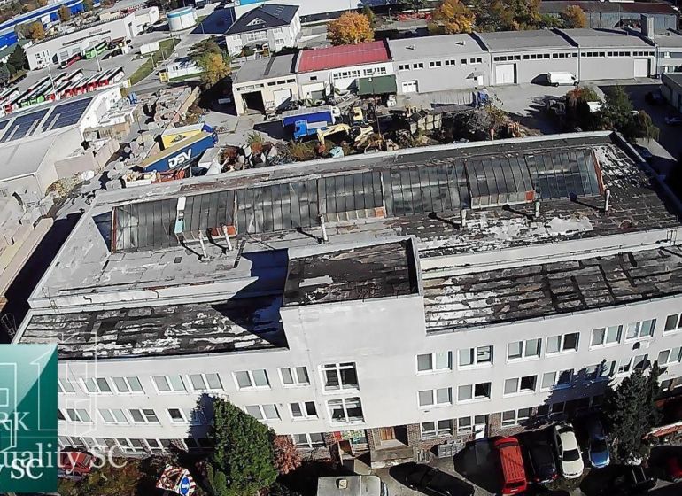Production facilities on Staviteľská Street in Bratislava III with industrial buildings in the background.