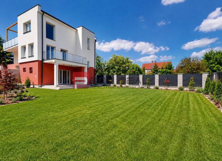A family house on Sládkovičova Street in Modra with a large well-maintained garden and terrace.