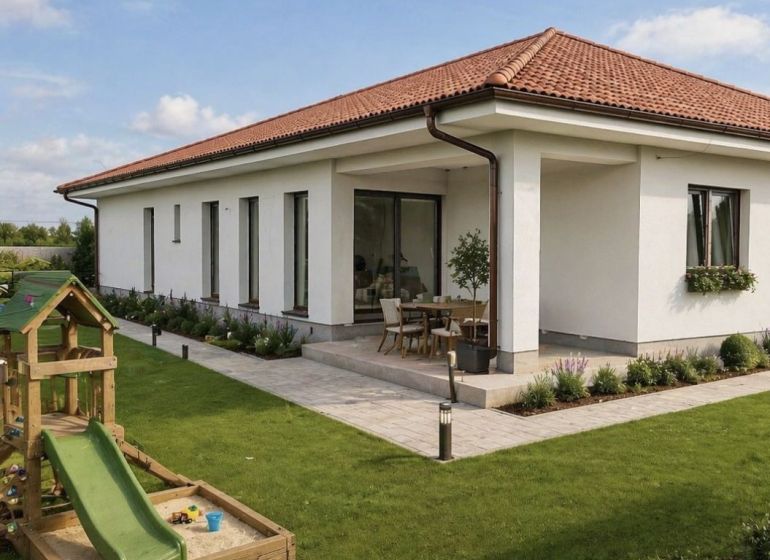 A family house in Michal na Ostrove with a terrace, garden, and wooden children's playground.