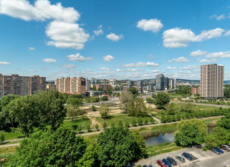 Bratislava - Petržalka, Lachova Street, display of 3-room apartments among greenery and a small river.
