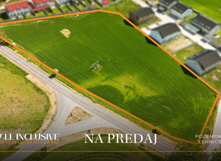 Residential plots in Lehnice, surrounded by roads and neighboring houses.