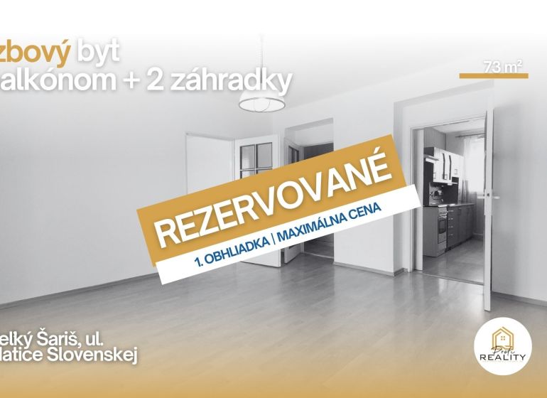 A 2-room apartment with a wooden decor floor and open doors to the kitchen.